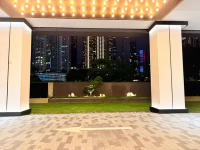 a pavilion with a view of a city at night at Next To KLCC By Home Stay in Kuala Lumpur