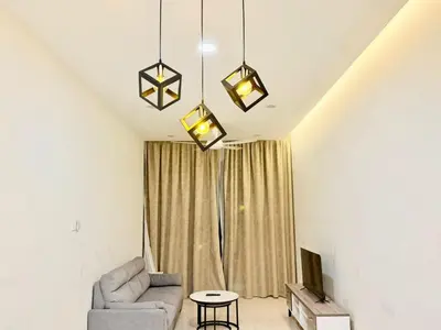 a living room with a couch and a table at Home Town Next To Kuala Lumpur City in Kuala Lumpur