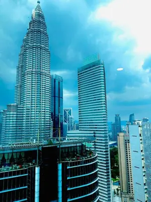 a group of tall buildings in a city at Axora Sky Suites KLCC in Kuala Lumpur