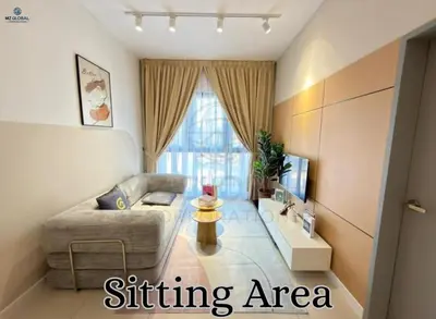a living room with a couch and a tv at Skyline Suites Kuala Lumpur in Kuala Lumpur