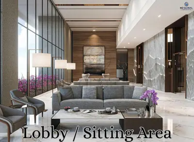 a lobby of a hotel with a couch and chairs at Skyline Suites Kuala Lumpur in Kuala Lumpur