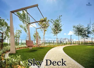 a park with a bench and a swing deck at Skyline Suites Kuala Lumpur in Kuala Lumpur