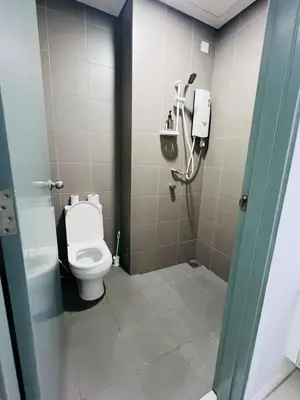 a bathroom with a toilet in a stall at Elegant Home at Mercu Summer Suites By KLCC in Kuala Lumpur