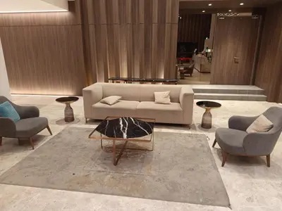 a living room with a couch and two chairs and a table at Presidential Suite Quill Residence KLCC in Kuala Lumpur