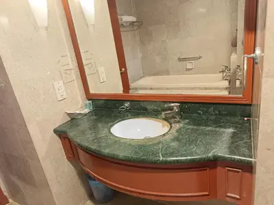a bathroom with a sink and a mirror at Berjaya Times Square KLCC by cozy stay in Kuala Lumpur