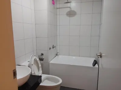 a bathroom with a toilet and a tub and a sink at Mix Home At Chamber Residence in Kuala Lumpur