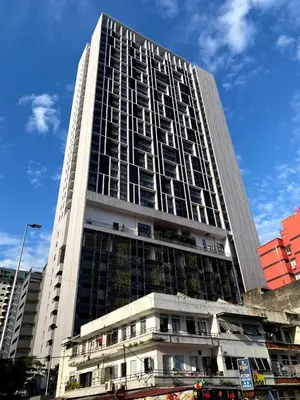 a tall building with windows on the side of it at Chambers Residence Specious Suites KlCC in Kuala Lumpur