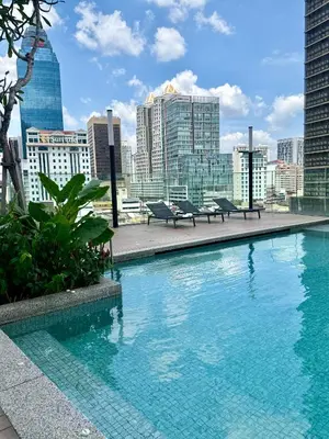 a swimming pool with a view of the city at Kuala Lumpur Quill Residences By AR Stay in Kuala Lumpur