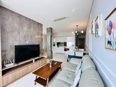 a living room with a couch and a tv at SKY SUiTES KLCC BY RT GROUP in Kuala Lumpur