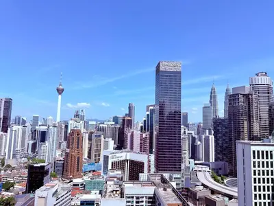 a view of a large city with tall buildings at Luxury Dream Home At Axon Residence Bukit Bintang Klcc pavilion in Kuala Lumpur