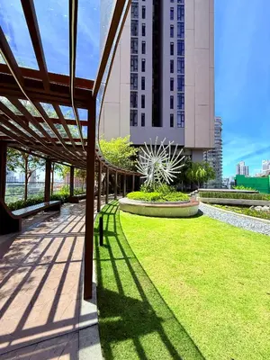 a view of a park with a large building at Luxury Dream Home At Axon Residence Bukit Bintang Klcc pavilion in Kuala Lumpur