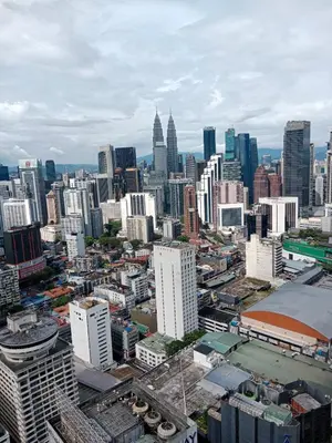 an aerial view of a city with tall buildings at Realty Services Suites at Berjaya Times Square in Kuala Lumpur
