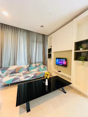 a bedroom with a bed and a television in it at The Grand klcc at platinum face in Kuala Lumpur