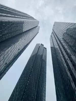 two tall buildings looking up into the sky at KL Suites At Star KLCC in Kuala Lumpur
