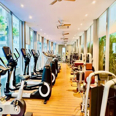 a gym with treadmills and elliptical machines at Vortex klcc by DMK Luxury suites Apartment in Kuala Lumpur