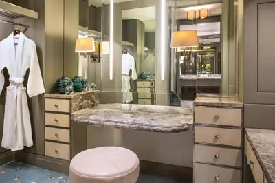 a bathroom with a sink and a mirror at The St. Regis Kuala Lumpur in Kuala Lumpur