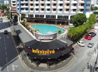 an aerial view of a hotel with a pool at Oakwood Hotel & Residence Kuala Lumpur in Kuala Lumpur