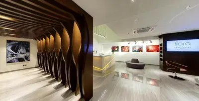 a showroom with a large screen in the middle of a room at Flora by Crossroads Hotel in Kuala Lumpur