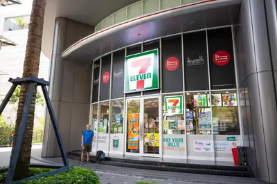 a man is standing in front of a store at Vortex KLCC by Luxury Suites Asia in Kuala Lumpur