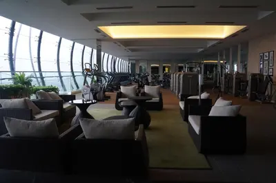 a lobby with couches and tables in a building at M City Lake View KLCCAmpang in Kuala Lumpur