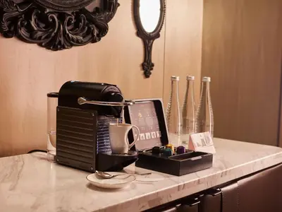 a counter with a coffee maker on a counter top at Sofitel Kuala Lumpur Damansara in Kuala Lumpur