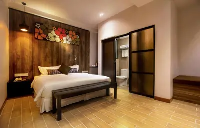 a bedroom with a bed and a bathroom at Hotel Twenty 8B in Kuala Lumpur
