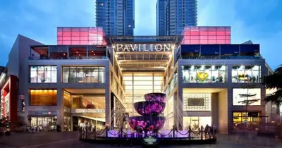 a building with a large purple sculpture in front of it at Kingston Hotel 1 - Bukit Bintang in Kuala Lumpur