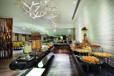 a buffet area of a hotel with food on display at Dorsett Kuala Lumpur in Kuala Lumpur