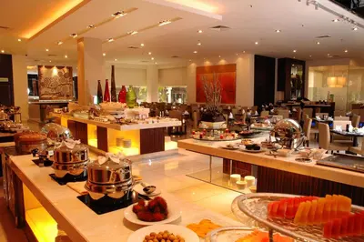 a restaurant with a lot of food on display at Seri Pacific Hotel Kuala Lumpur in Kuala Lumpur
