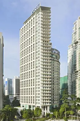 a building with an aco sign on top of it at Ascott Kuala Lumpur in Kuala Lumpur