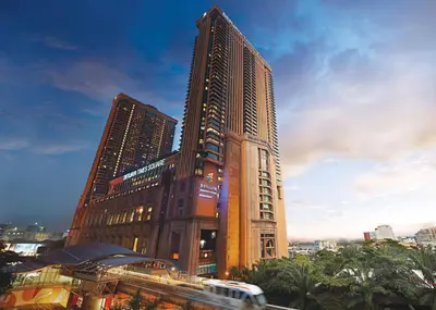 a tall building with a train in front of it at Berjaya Times Square Hotel, Kuala Lumpur in Kuala Lumpur