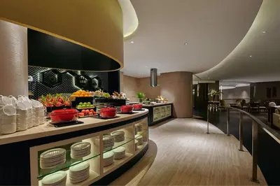 a kitchen with a counter with dishes on it at JW Marriott Kuala Lumpur in Kuala Lumpur