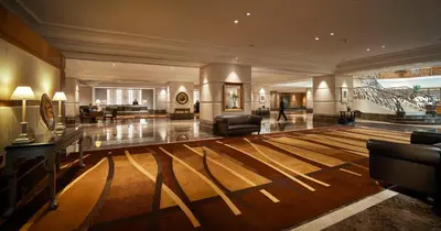 a large room with a lobby with a living room at Sunway Putra Hotel Kuala Lumpur in Kuala Lumpur