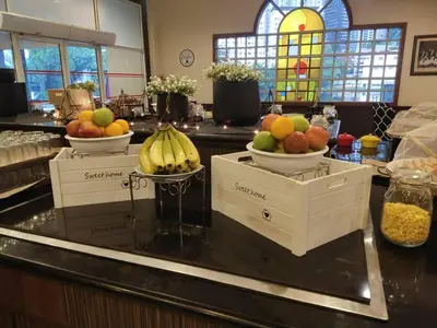 two baskets of fruit on a counter in a kitchen at Flamingo Hotel By The Lake, Kuala Lumpur in Kuala Lumpur