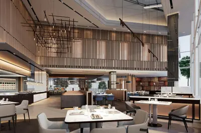 a rendering of a restaurant with tables and chairs at Petaling Jaya Marriott Hotel in Petaling Jaya