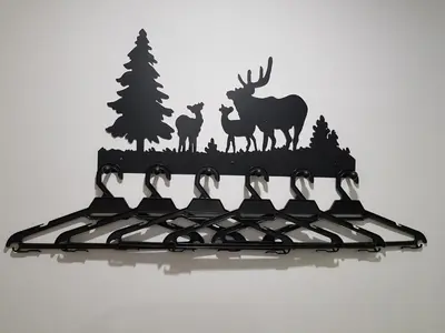 a black metal rack with deer silhouettes on it at Leo Palace Hotel New Wing, WTC Kuala Lumpur in Kuala Lumpur