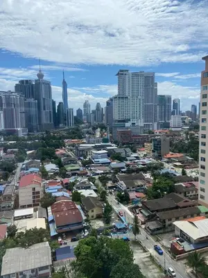 an aerial view of a city with tall buildings at Arina Unity in Kuala Lumpur
