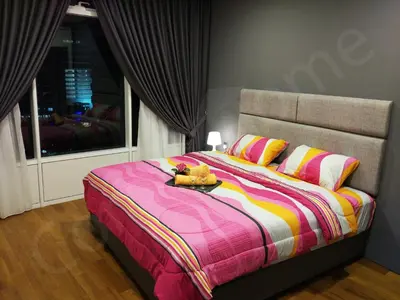 a bedroom with a bed with stuffed animals on it at 5 STAR & LUXURY Apartment near KLCC/ KL City Centre in Kuala Lumpur
