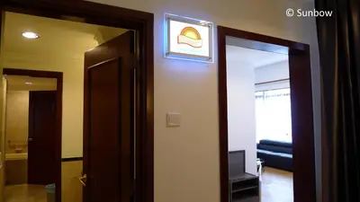 a door to a room with a mirror in a room at Sunbow Suites @ Times Square Kuala Lumpur in Kuala Lumpur