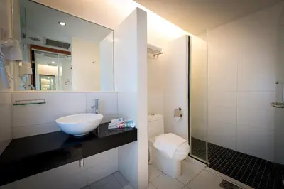 a bathroom with a sink and a toilet at Hotel Sentral Pudu @ City Centre / Bukit Bintang in Kuala Lumpur