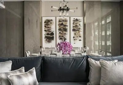 a dining room with a table with purple flowers at Four Seasons Hotel Kuala Lumpur in Kuala Lumpur
