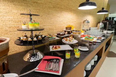 a buffet line with many different types of food at Tamu Hotel & Suites Kuala Lumpur in Kuala Lumpur