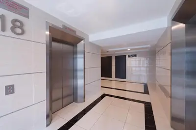 a hallway with a elevator in a building at Fahrenheit Suites Bukit Bintang, Kuala Lumpur in Kuala Lumpur