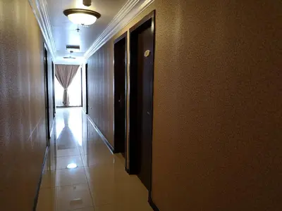 a hallway of a building with a hallwayasteryasteryasteryasteryasteryasteryasteryastery at Hotel Grand Palace Ampang in Ampang