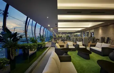 a room with couches and chairs on a cruise ship at Mcity Jalan Ampang in Kuala Lumpur