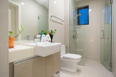 a bathroom with a sink and a toilet and a shower at Mcity Jalan Ampang in Kuala Lumpur