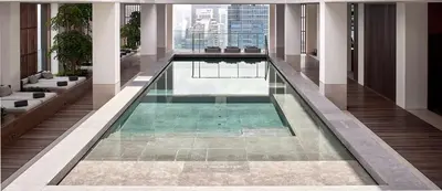 a swimming pool in the middle of a building at Alila Bangsar Kuala Lumpur in Kuala Lumpur