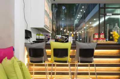 a group of chairs sitting on top of a table at V Garden Hotel in Kuala Lumpur