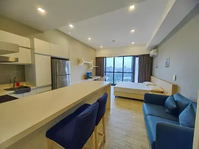 a room with a kitchen and a living room at M CITY Kl City in Kuala Lumpur