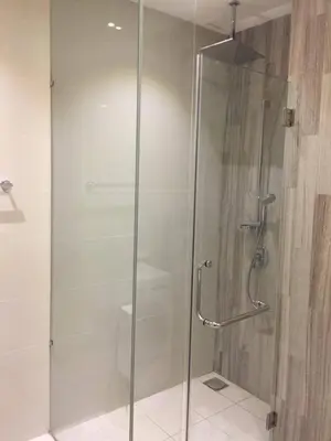 a shower with a glass door in a bathroom at M CITY Kl City in Kuala Lumpur